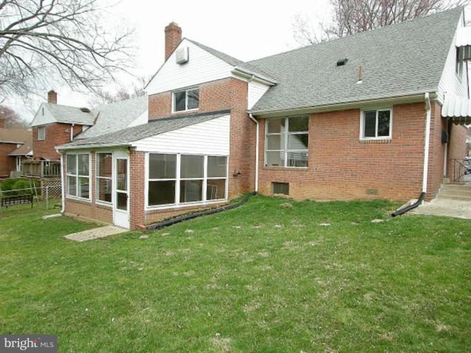 708 Stirling Road Silver Spring, MD 20901 - Photo 1 of 19 a view of a house with a garden