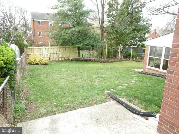 708 Stirling Road Silver Spring, MD 20901 - Photo 5 of 19 a view of a house with backyard
