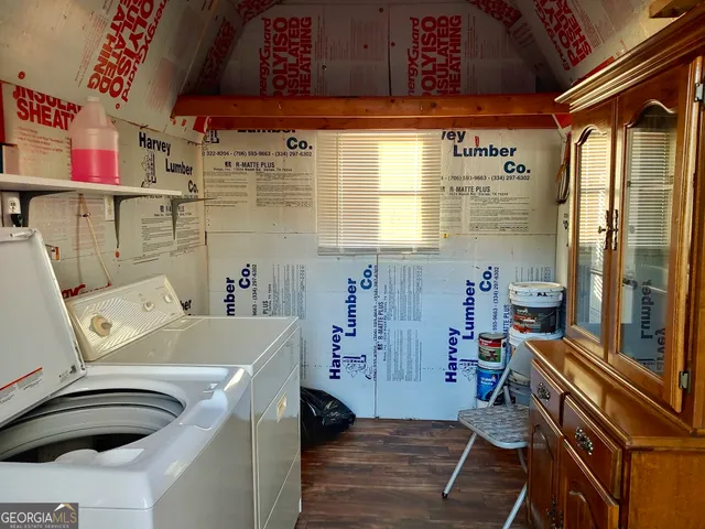 a utility room with dryer and washer