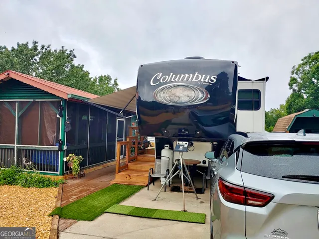 a view of a chairs and tables in the patio