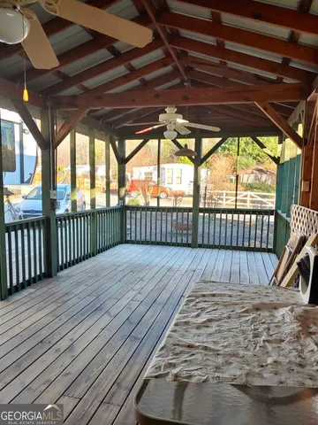 a view of outdoor space with wooden deck