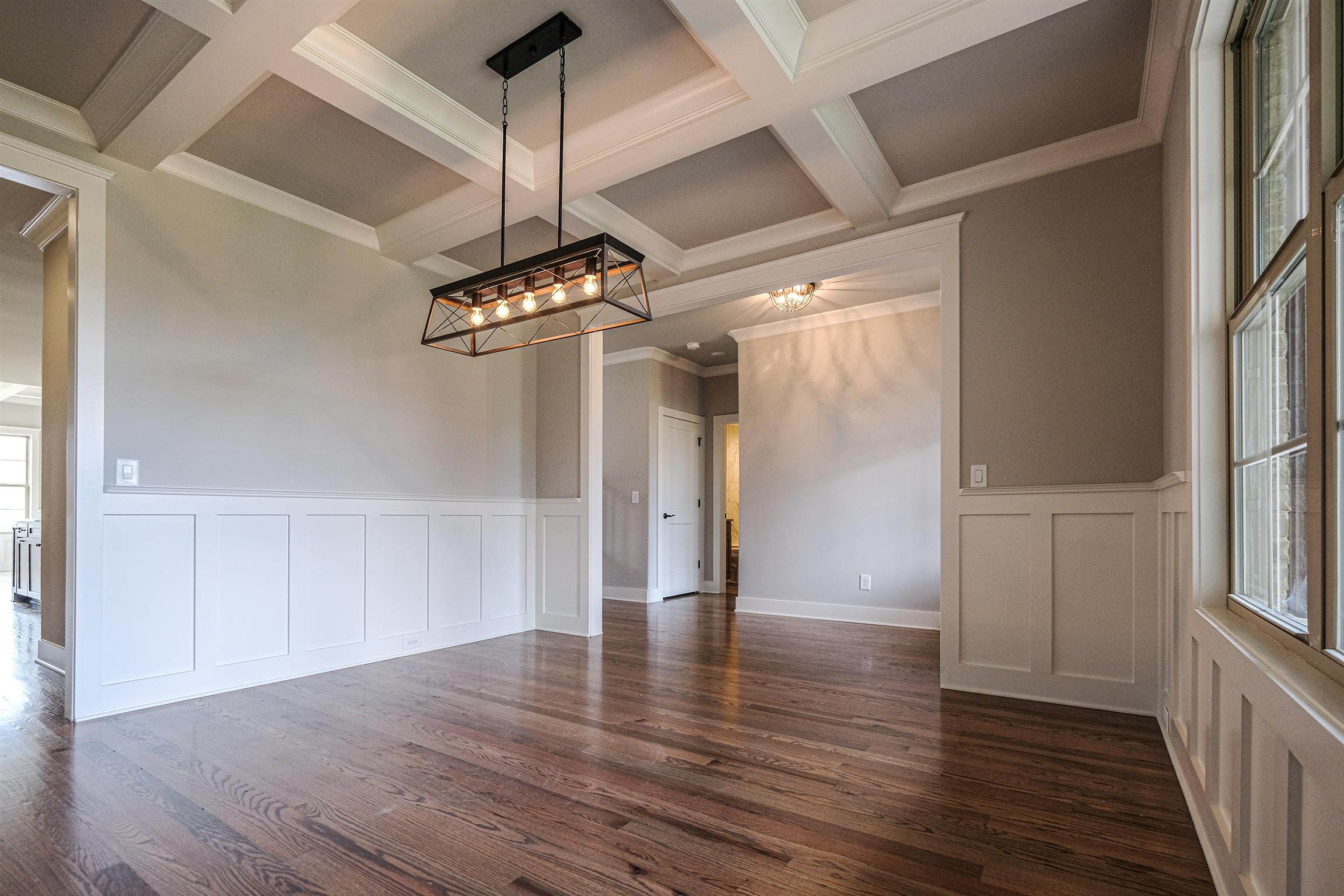 2034 Autumn Ridge Way Spring Hill, TN 37174 - Photo 3 of 30 Dining Room with coffered ceilings and Shaker-style chair rail trim.