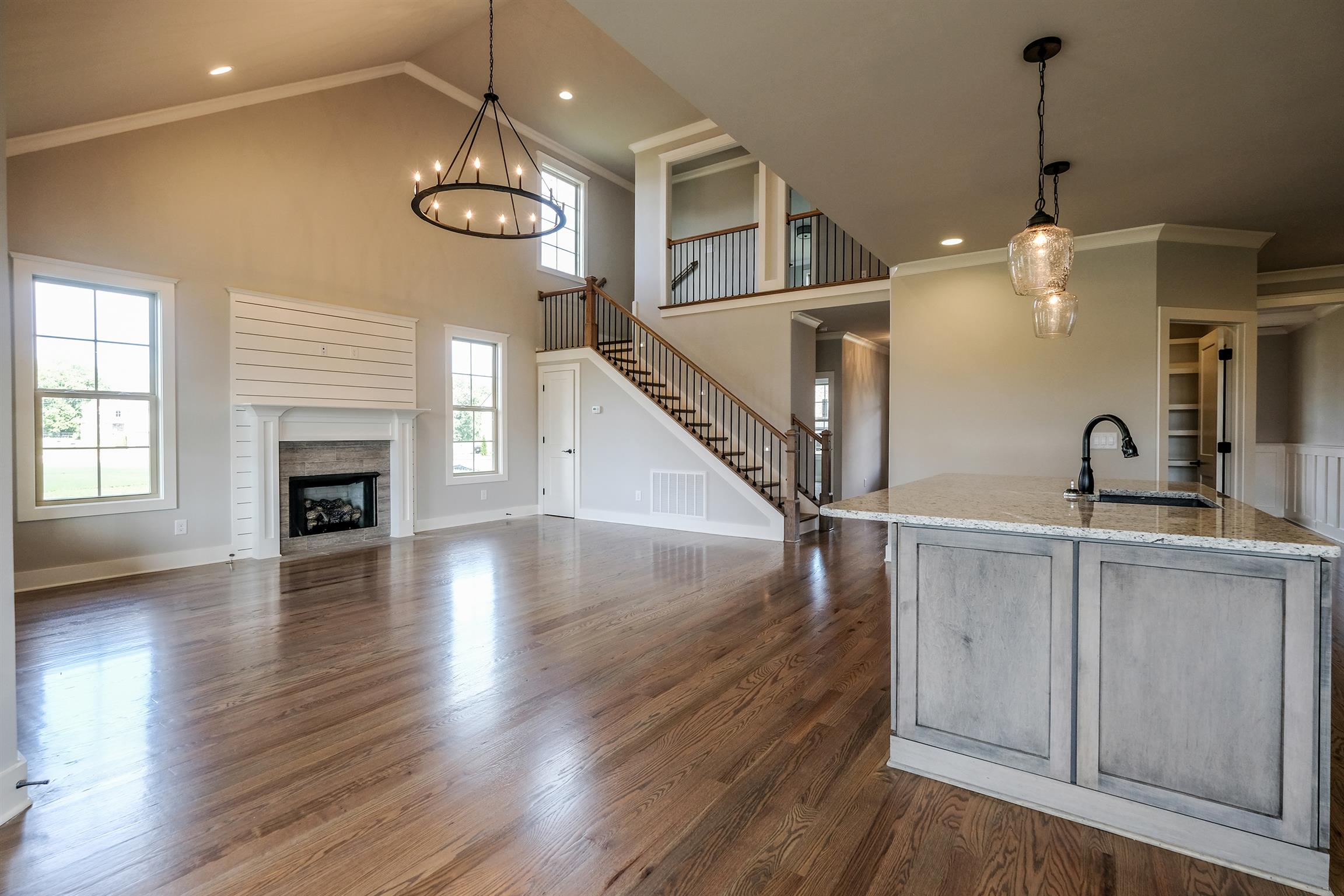 2034 Autumn Ridge Way Spring Hill, TN 37174 - Photo 5 of 30 Great Room offers shiplap trim around the fireplace, as well as a closet under the stairs.