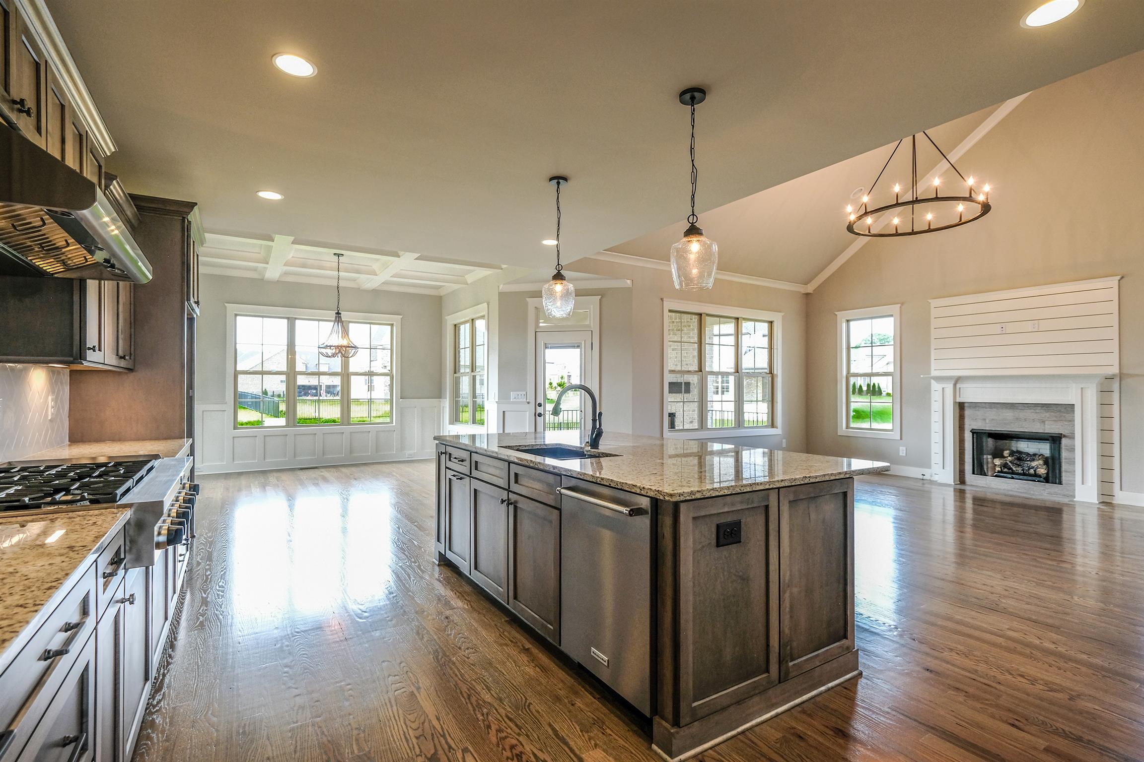 2034 Autumn Ridge Way Spring Hill, TN 37174 - Photo 6 of 30 Chef's kitchen offers granite countertops, stainless appliances, and a large island.