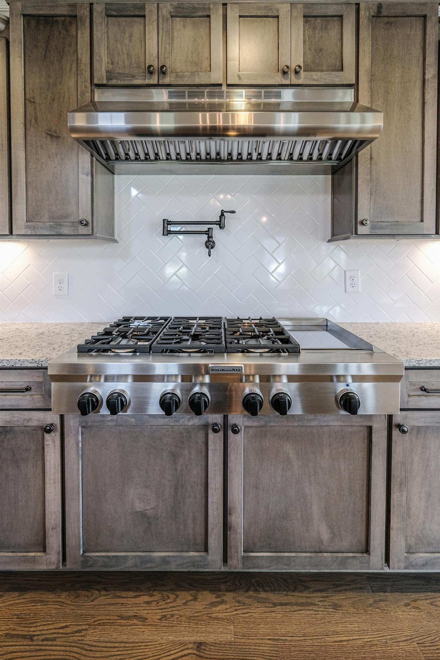 2034 Autumn Ridge Way Spring Hill, TN 37174 - Photo 8 of 30 Upgraded 6-burner, gas cook-top with pot-filler.