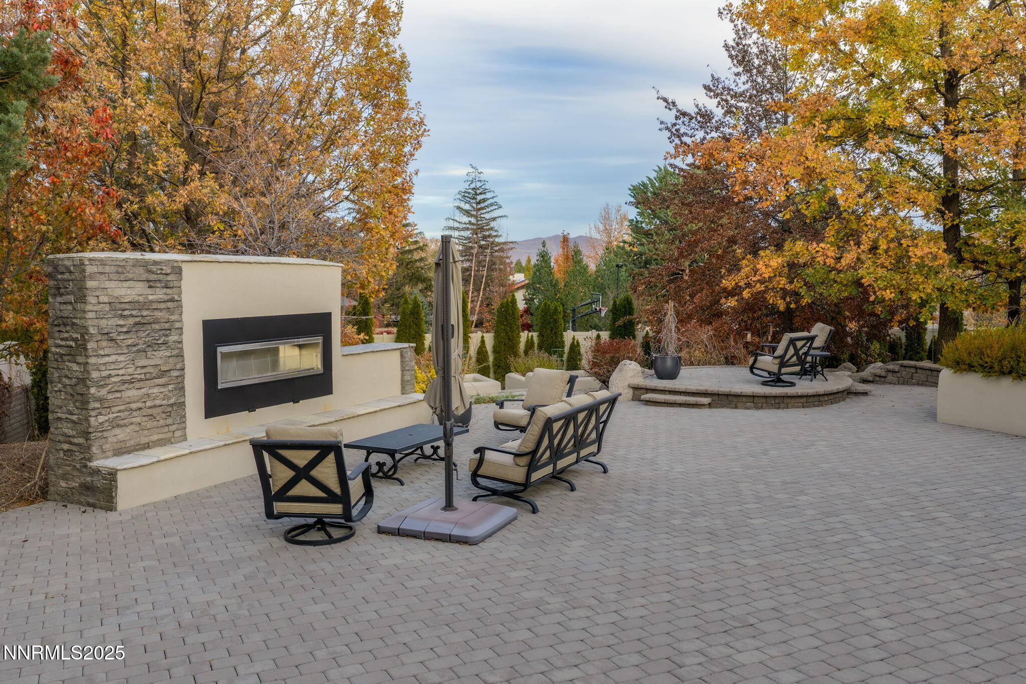 1825 Manzanita Circle Reno, NV 89509 - Photo 41 of 52 a view of a patio with a table and chairs