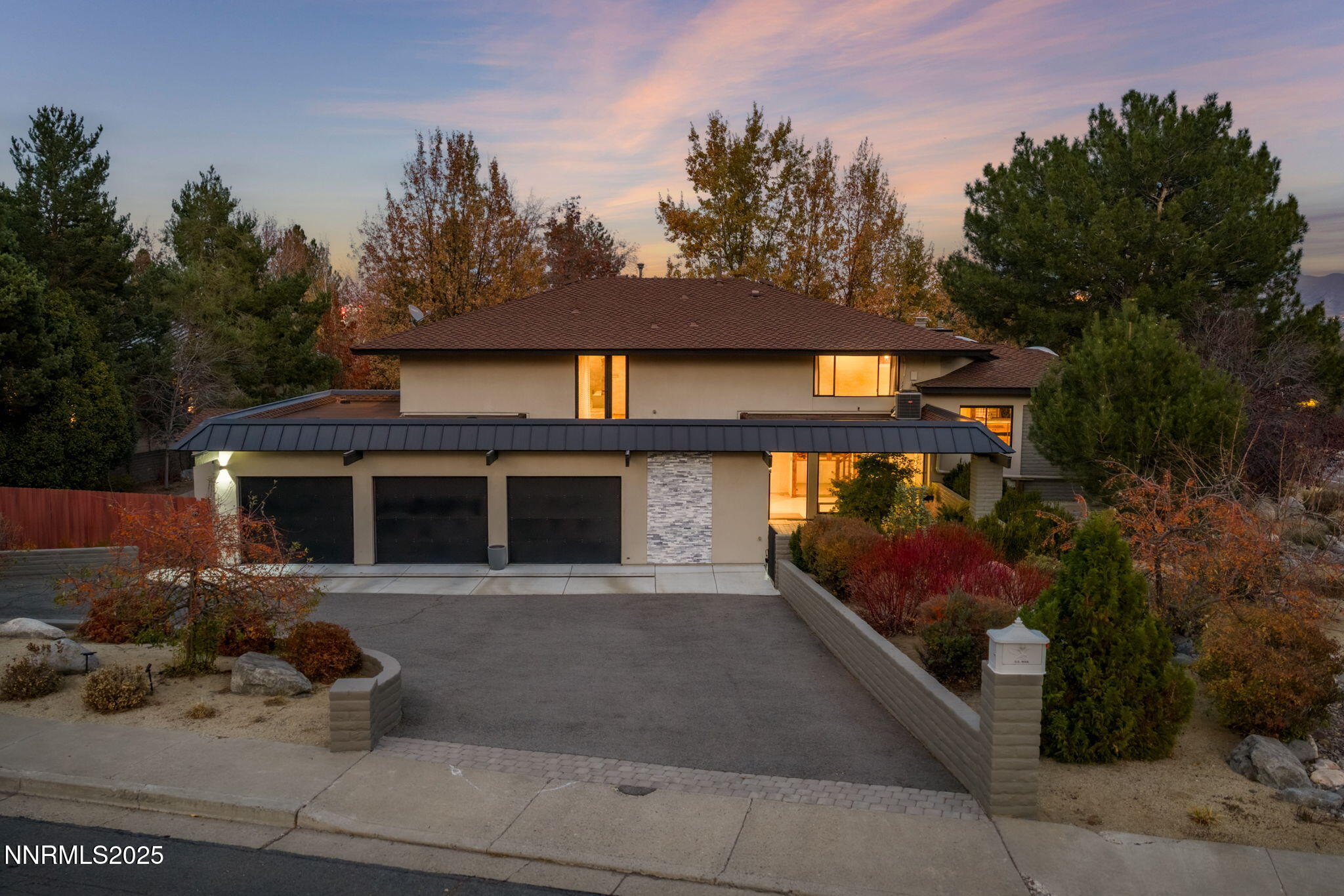 1825 Manzanita Circle Reno, NV 89509 - Photo 50 of 52 front view of a house with a yard