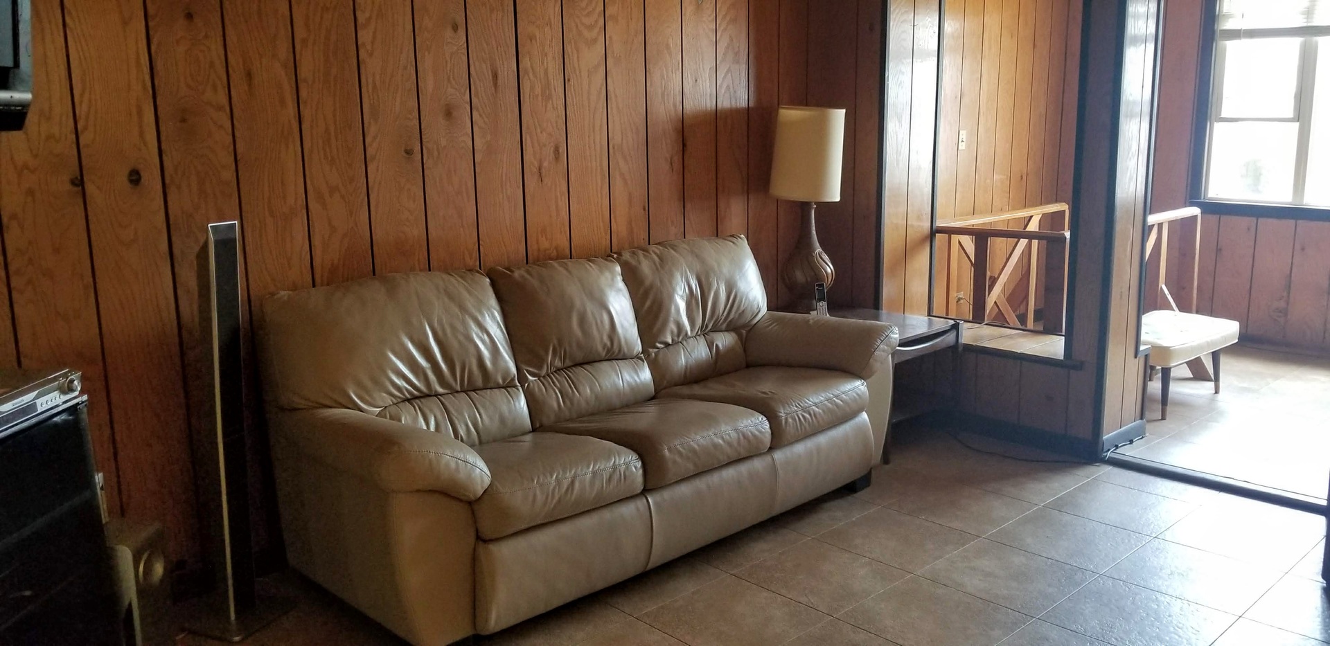 7418 South Rhodes Avenue Chicago, IL 60619 - Photo 20 of 41 a living room with furniture and a window