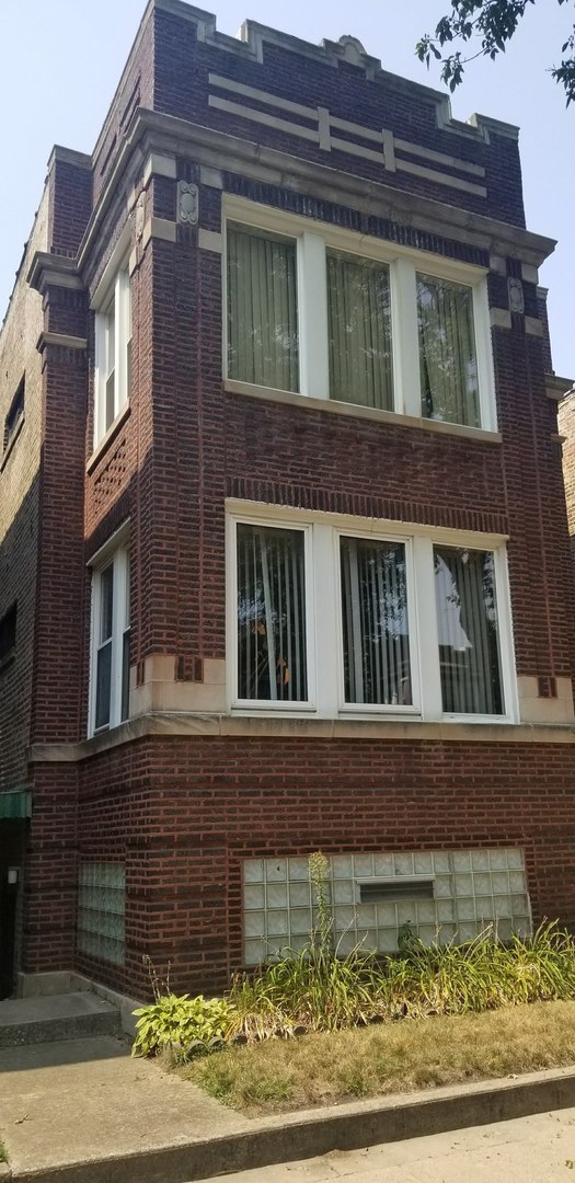 7418 South Rhodes Avenue Chicago, IL 60619 - Photo 3 of 41 a view of a building