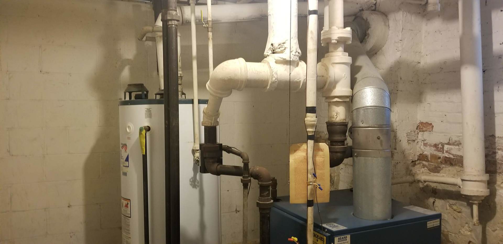 7418 South Rhodes Avenue Chicago, IL 60619 - Photo 32 of 41 a bathroom with a mirror