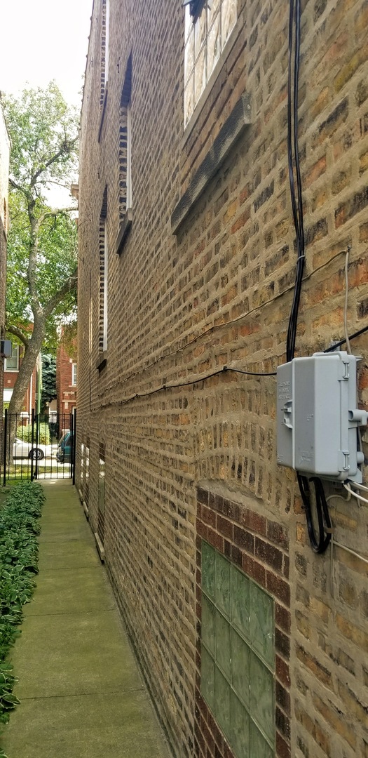 7418 South Rhodes Avenue Chicago, IL 60619 - Photo 41 of 41 a bathroom with a shower