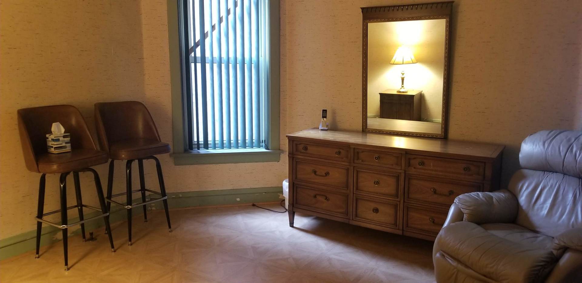 7418 South Rhodes Avenue Chicago, IL 60619 - Photo 9 of 41 a living room with furniture and a flat screen tv