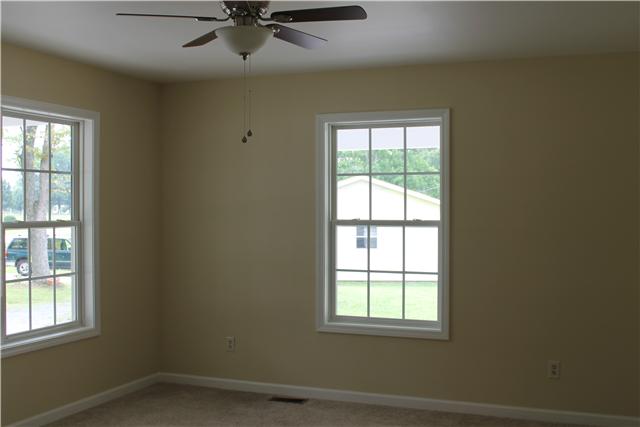 1477 Riley Creek Road Normandy, TN 37360 - Photo 7 of 17 Nice living room w/paint and carpet, windows and lighting....