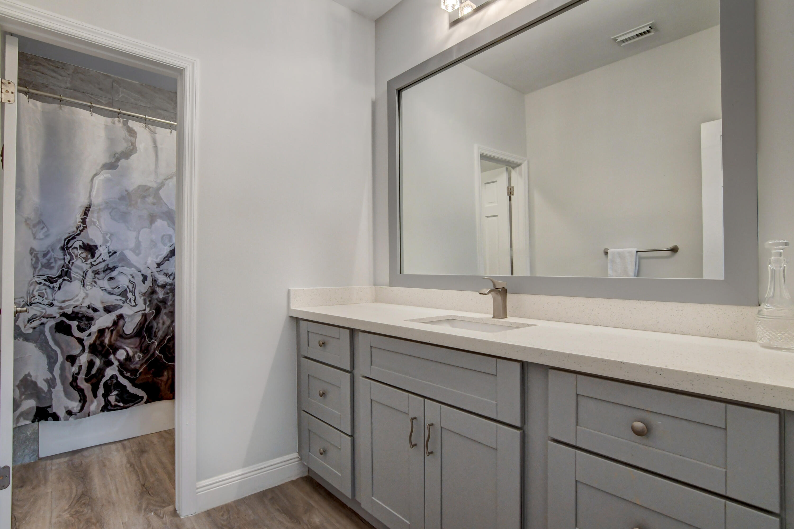 921 Southwest 20th Street Boca Raton, FL 33486 - Photo 40 of 56 a bathroom with a sink and mirror