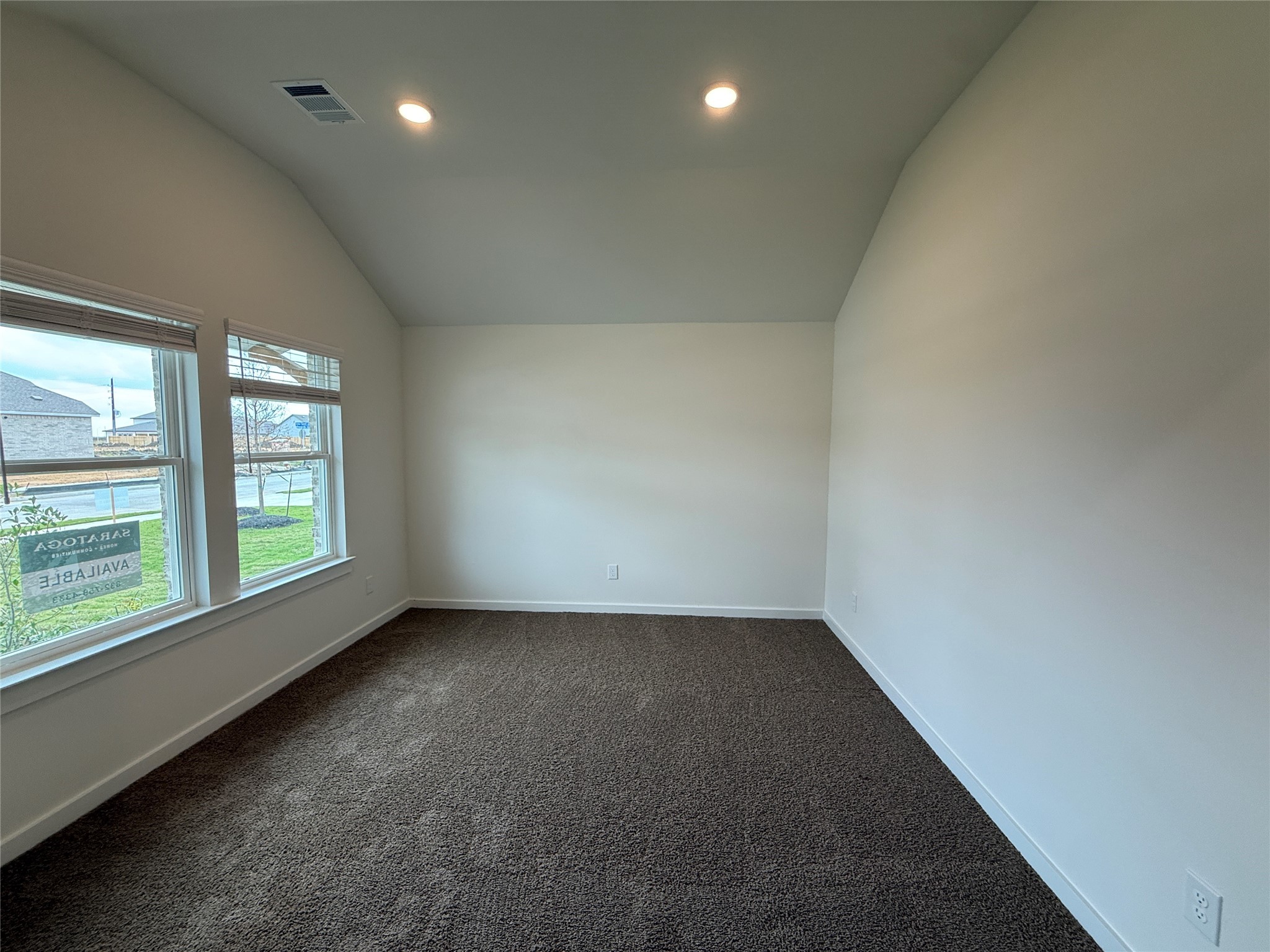 3130 Emerald Hills Drive Angleton, TX 77515 - Photo 14 of 17 an empty room with a window