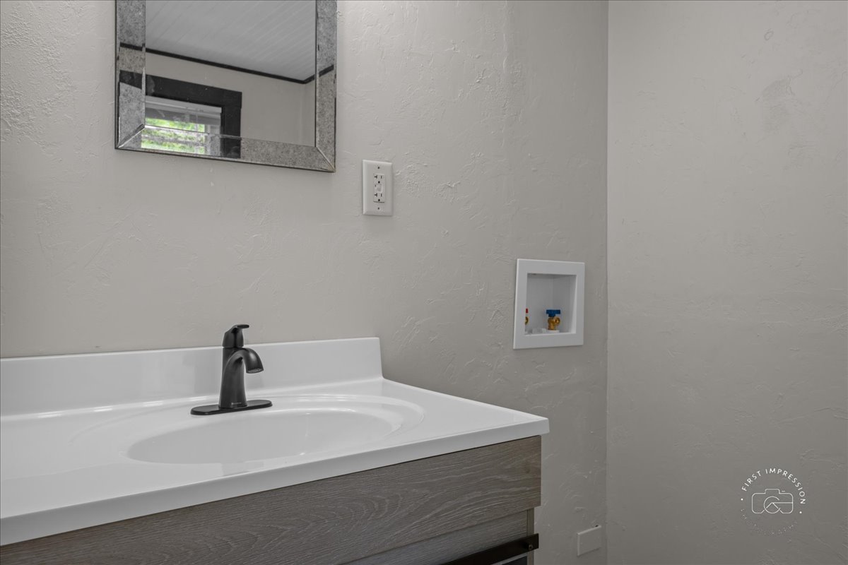32W167 Army Trail Road Wayne, IL 60184 - Photo 12 of 19 a bathroom with a sink