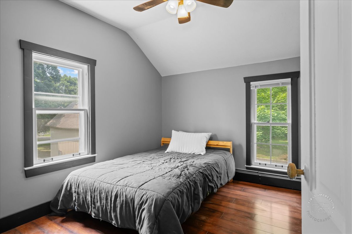 32W167 Army Trail Road Wayne, IL 60184 - Photo 15 of 19 a bedroom with a bed and window