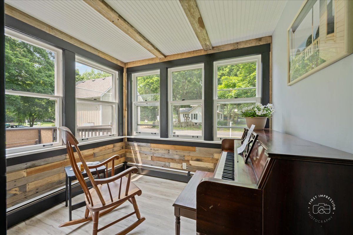 32W167 Army Trail Road Wayne, IL 60184 - Photo 10 of 19 a view of a room with lounge chair and large windows