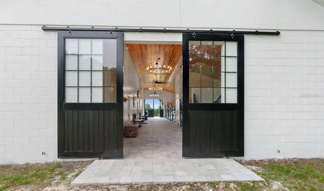 a view of staircase and kitchen view