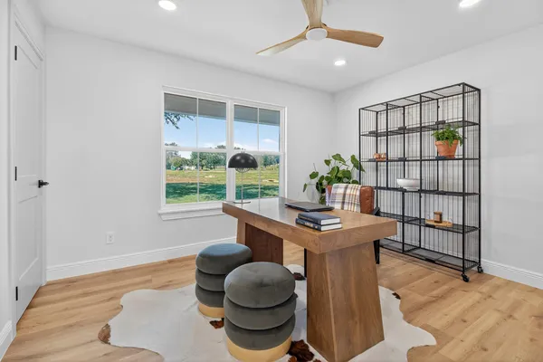 a workspace with furniture and window