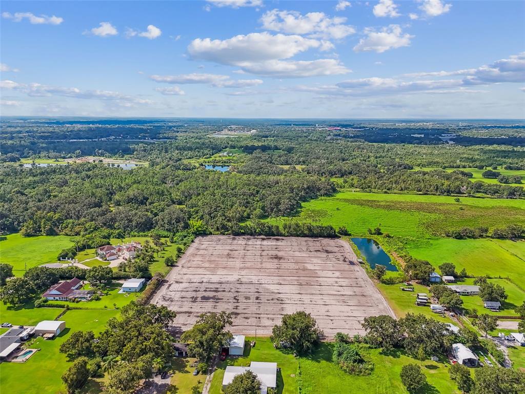 1715 West Sam Allen Road Plant City, FL 33565 - Photo 13 of 54 a view of a pathway with a yard