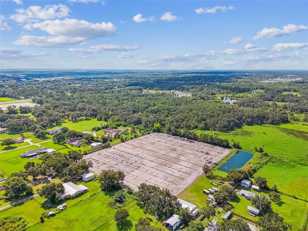 1715 West Sam Allen Road Plant City, FL 33565 - Photo 14 of 54 a view of a garden with an ocean