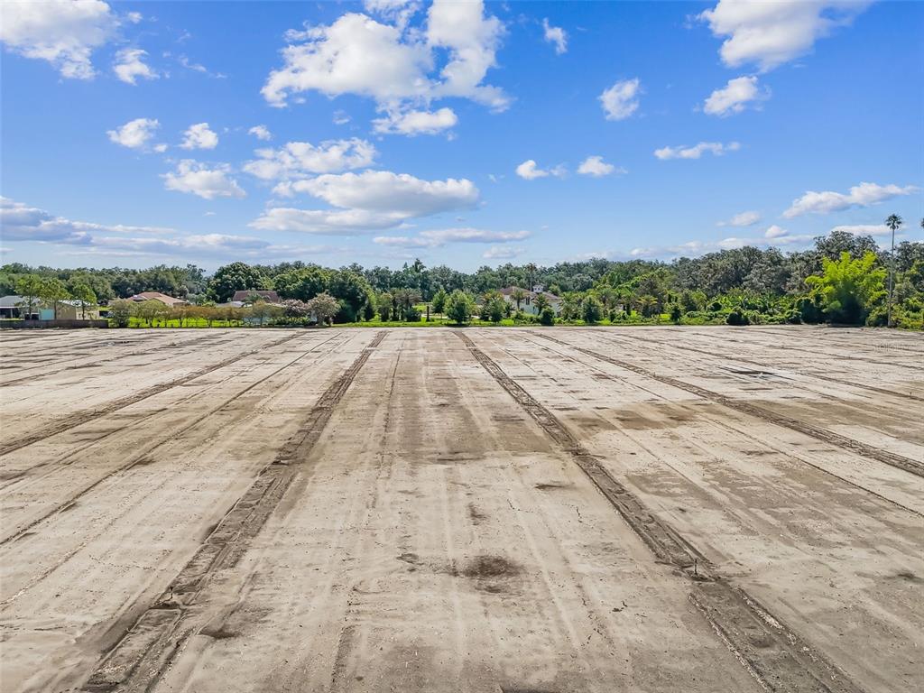 1715 West Sam Allen Road Plant City, FL 33565 - Photo 36 of 54 a view of an outdoor space and a yard