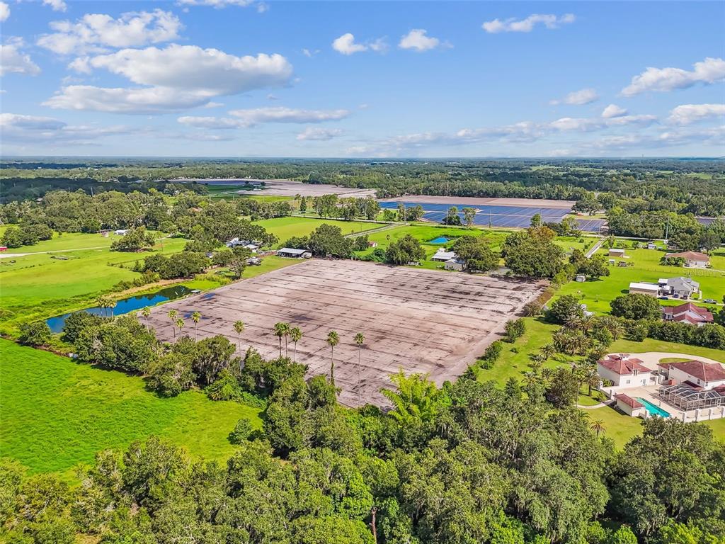 1715 West Sam Allen Road Plant City, FL 33565 - Photo 8 of 54 a view of a lake with a city
