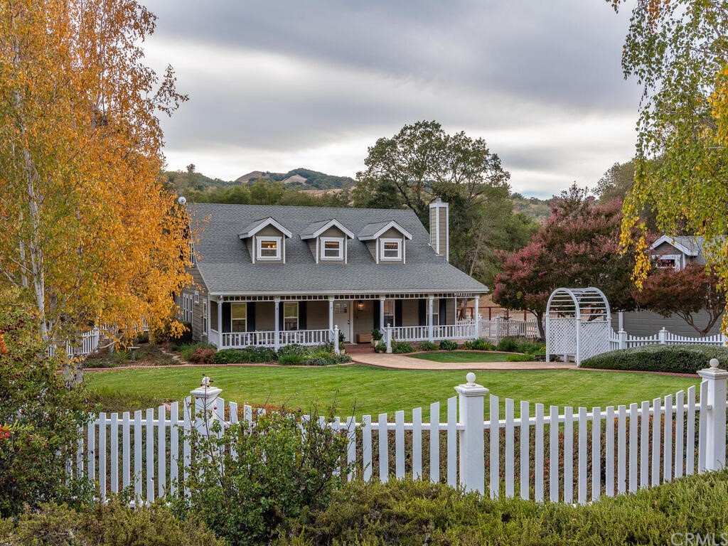 6270 Lomitas Road Atascadero, CA 93422 - Photo 1 of 1 a front view of a house with a garden