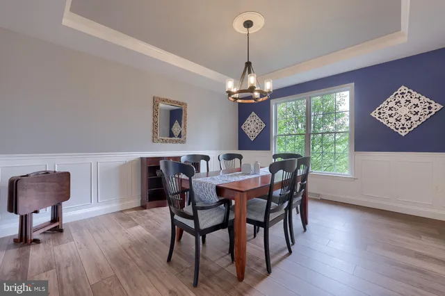 a view of a room with gym equipment and windows