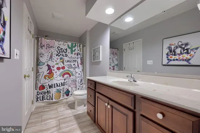 a open kitchen with a wooden floor