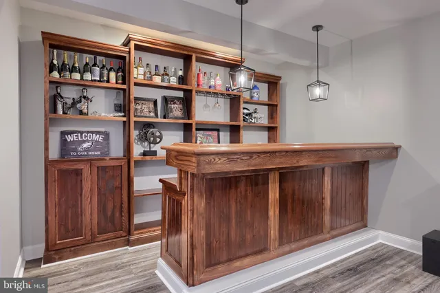 a view of a livingroom with furniture and a flat screen tv