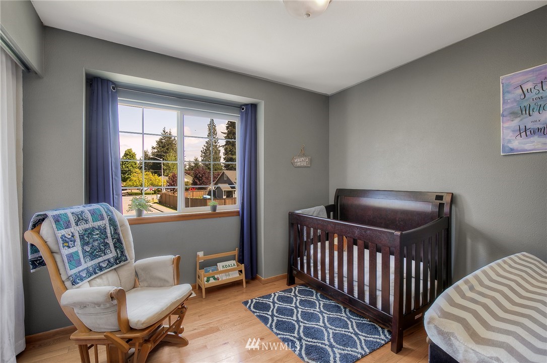 201 Morgan Road Everett, WA 98203 - Photo 15 of 29 a bedroom with furniture and a window