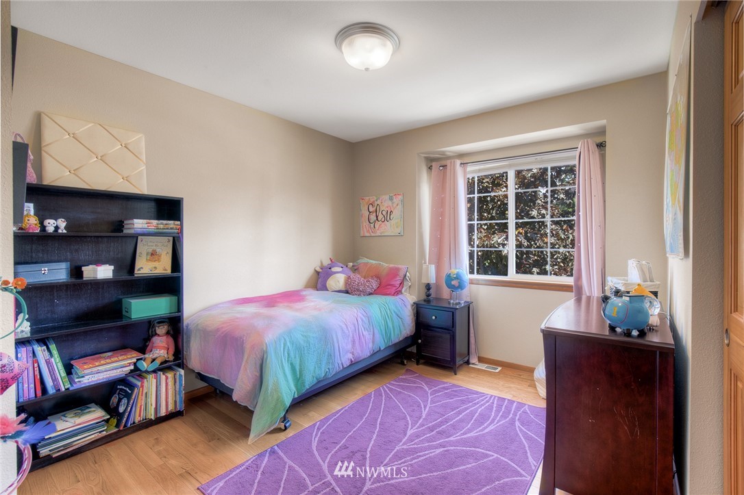 201 Morgan Road Everett, WA 98203 - Photo 16 of 29 a bedroom with a bed and a window