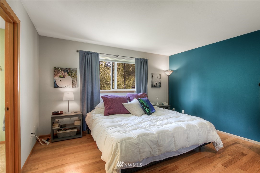 201 Morgan Road Everett, WA 98203 - Photo 17 of 29 a bedroom with a bed and a tv