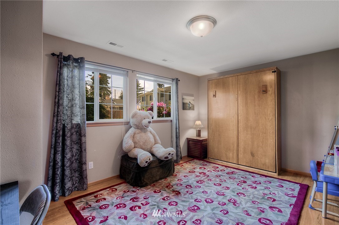 201 Morgan Road Everett, WA 98203 - Photo 23 of 29 a bedroom with furniture and a window