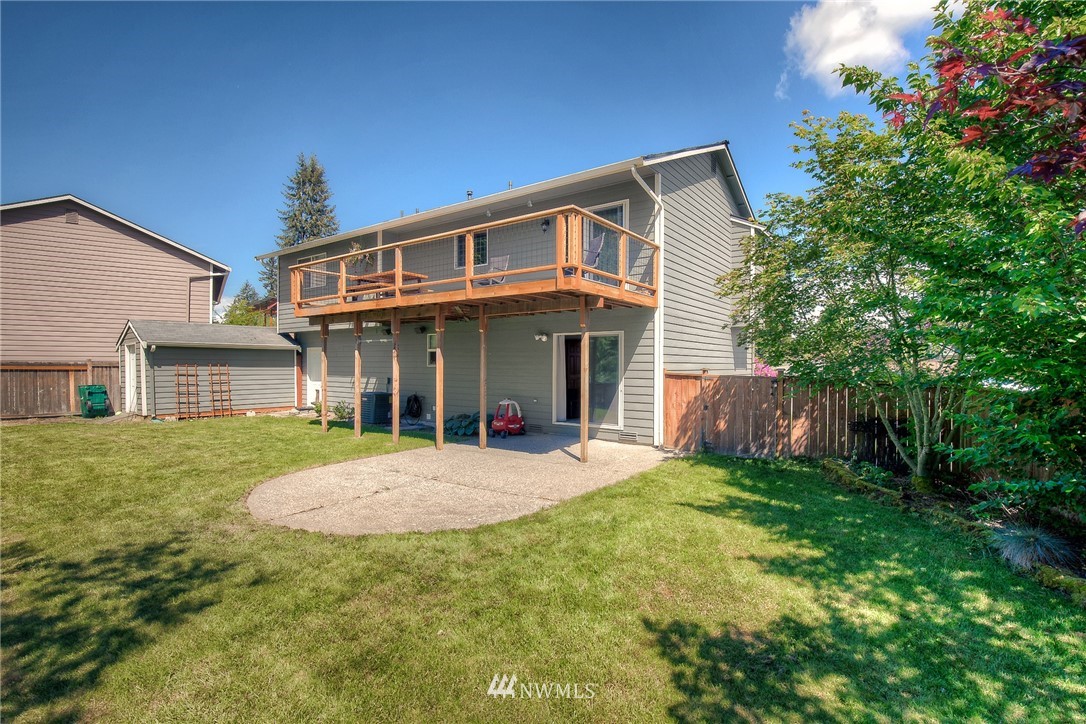201 Morgan Road Everett, WA 98203 - Photo 25 of 29 a front view of a house with a yard and porch