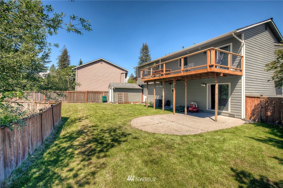201 Morgan Road Everett, WA 98203 - Photo 26 of 29 a front view of a house with a yard and porch