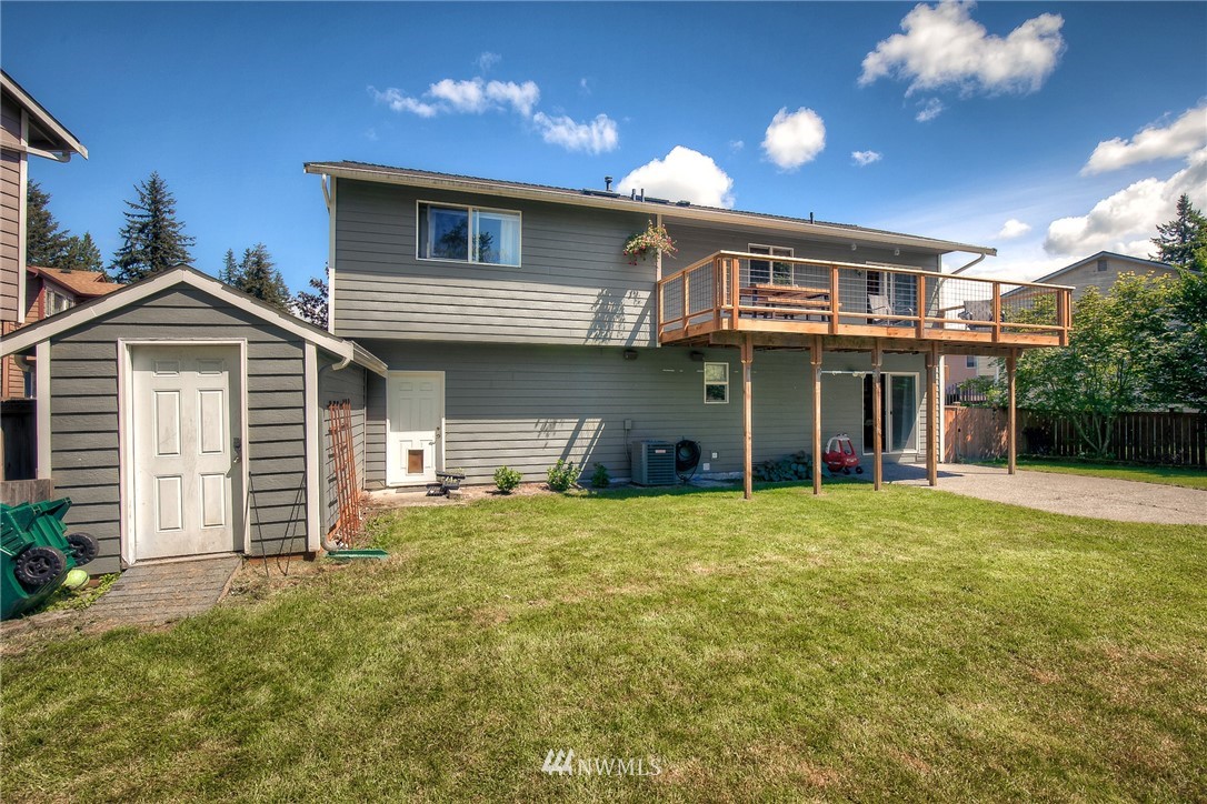 201 Morgan Road Everett, WA 98203 - Photo 27 of 29 a front view of a house with a yard