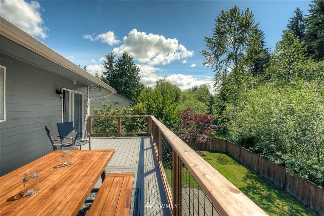 201 Morgan Road Everett, WA 98203 - Photo 29 of 29 a balcony view with two chairs and a table