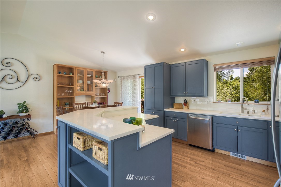 201 Morgan Road Everett, WA 98203 - Photo 6 of 29 a kitchen with sink and cabinets