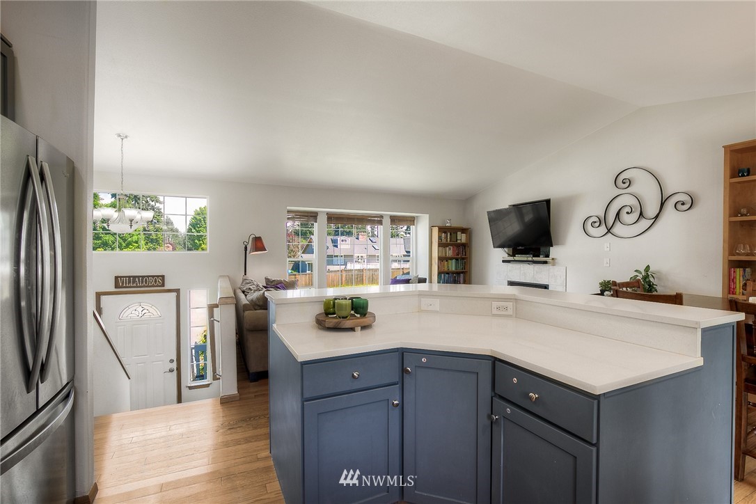 201 Morgan Road Everett, WA 98203 - Photo 10 of 29 a kitchen with a refrigerator and a sink