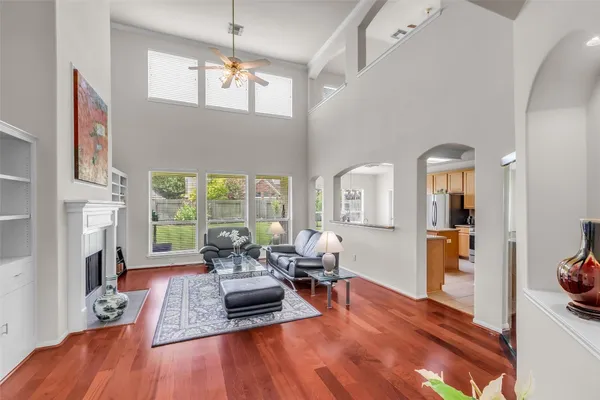 a living room with furniture and a fireplace
