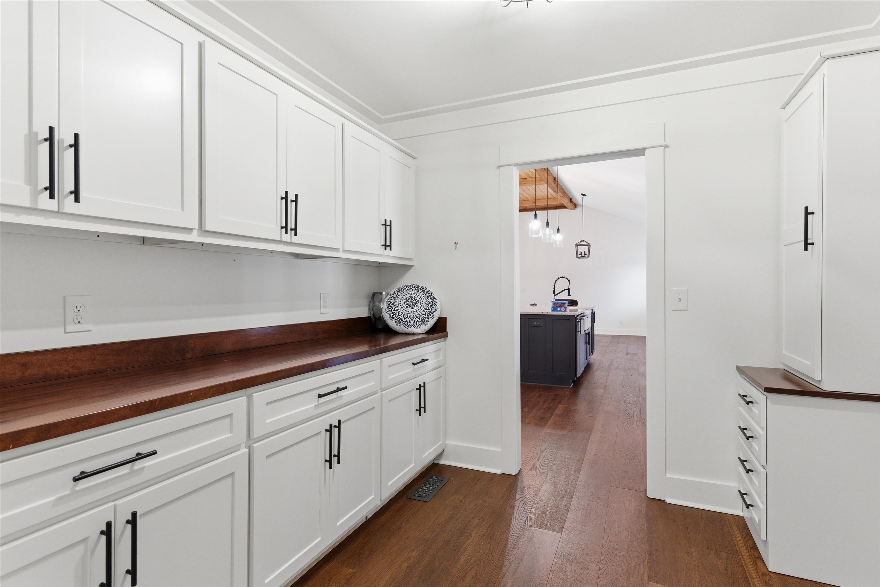 222 Barrett Street Bolivar, TN 38008 - Photo 11 of 30 Kitchen with wood counters, white cabinets, and dark wood-type flooring