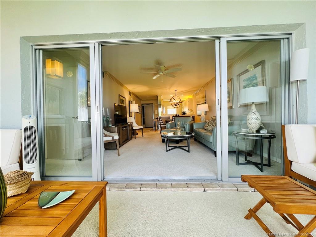 1550 Northeast Ocean Boulevard, Unit C204 Stuart, FL 34996 - Photo 23 of 54 a living room with furniture
