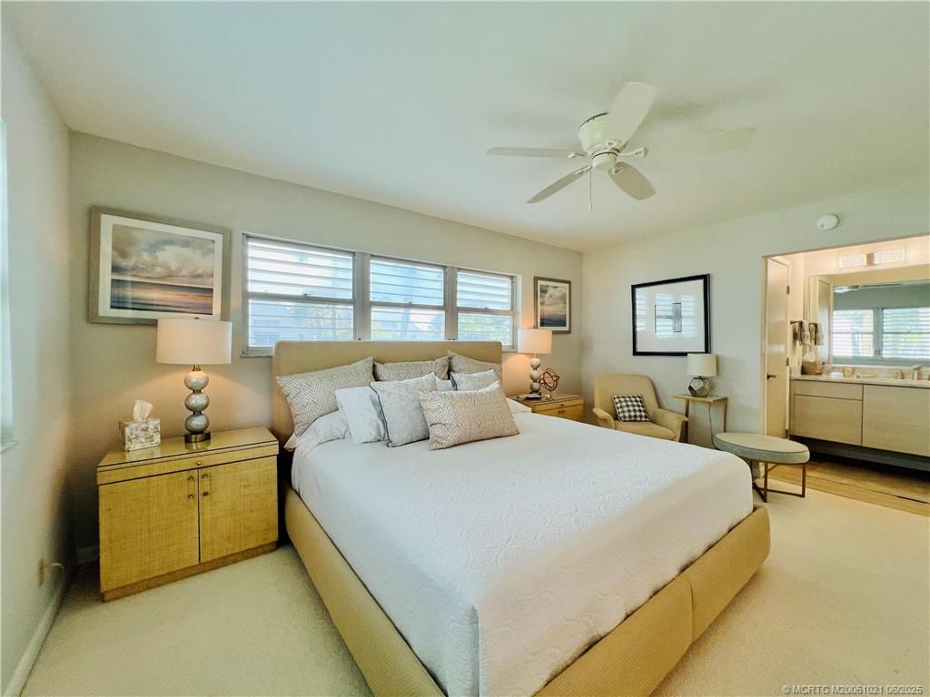 1550 Northeast Ocean Boulevard, Unit C204 Stuart, FL 34996 - Photo 25 of 54 a bedroom with bed and window
