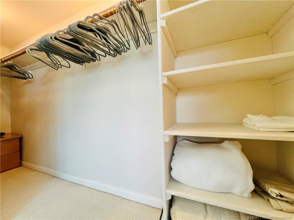 1550 Northeast Ocean Boulevard, Unit C204 Stuart, FL 34996 - Photo 30 of 54 a utility room with dryer and washer