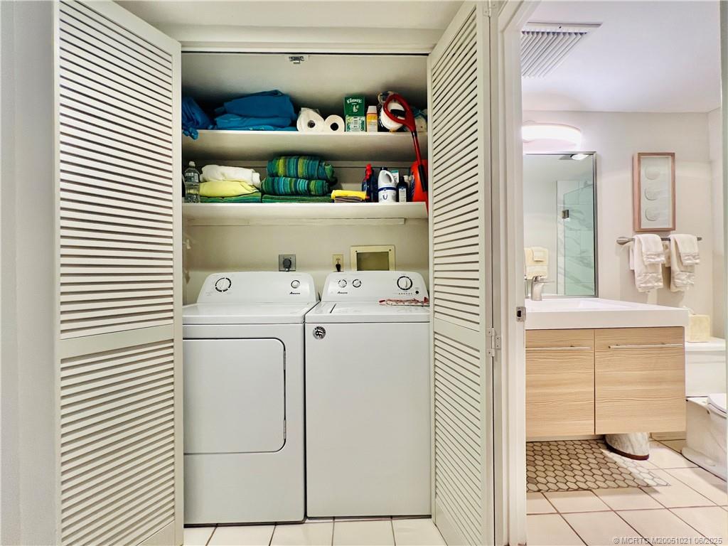 1550 Northeast Ocean Boulevard, Unit C204 Stuart, FL 34996 - Photo 43 of 54 a room with storage and utility