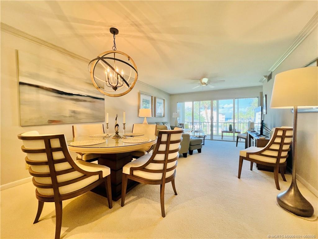 1550 Northeast Ocean Boulevard, Unit C204 Stuart, FL 34996 - Photo 9 of 54 a view of a livingroom with furniture and window