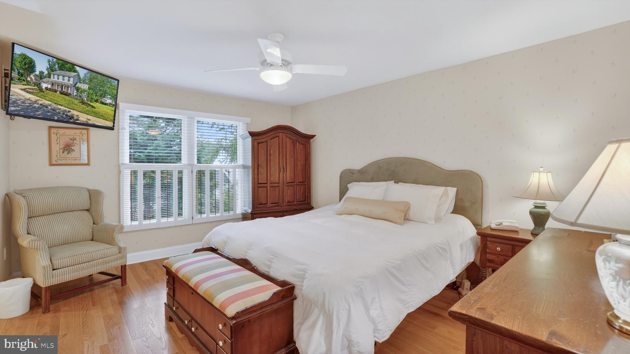 317 Canterfield Road Annapolis, MD 21403 - Photo 27 of 66 a bedroom with a bed couch and a window